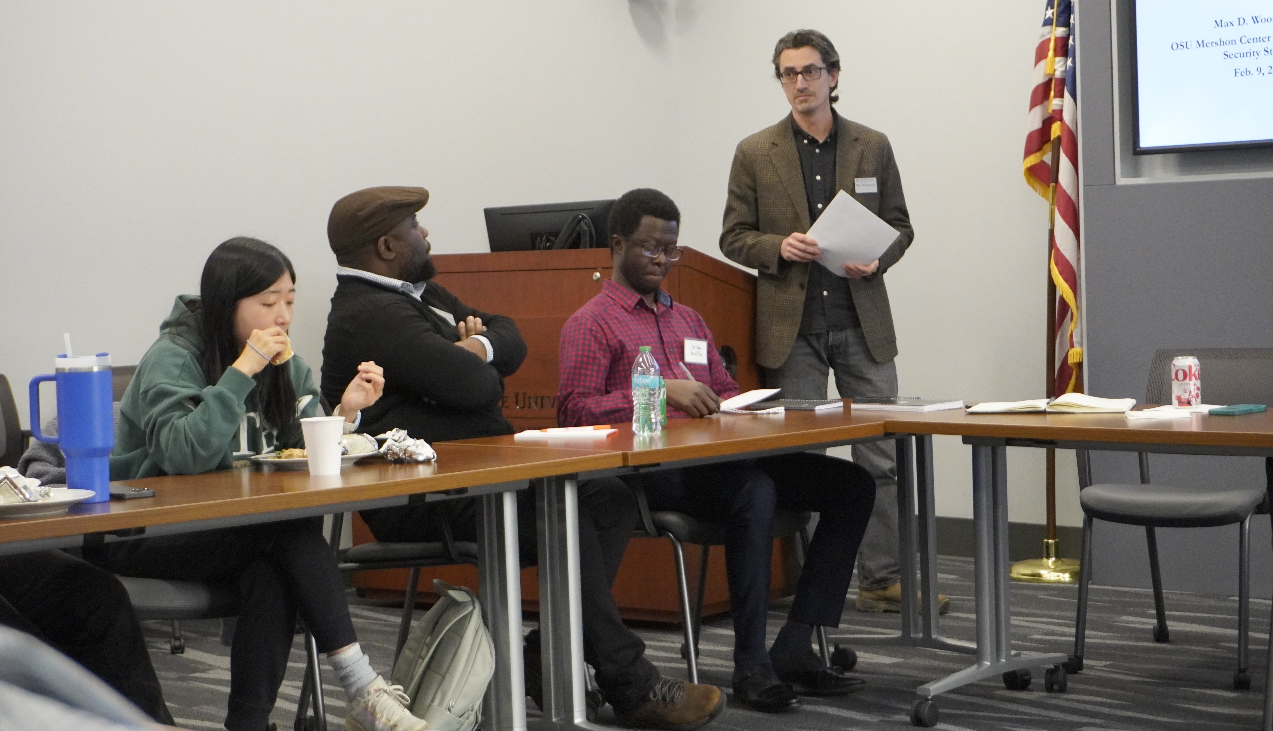 Professor and students in discussion