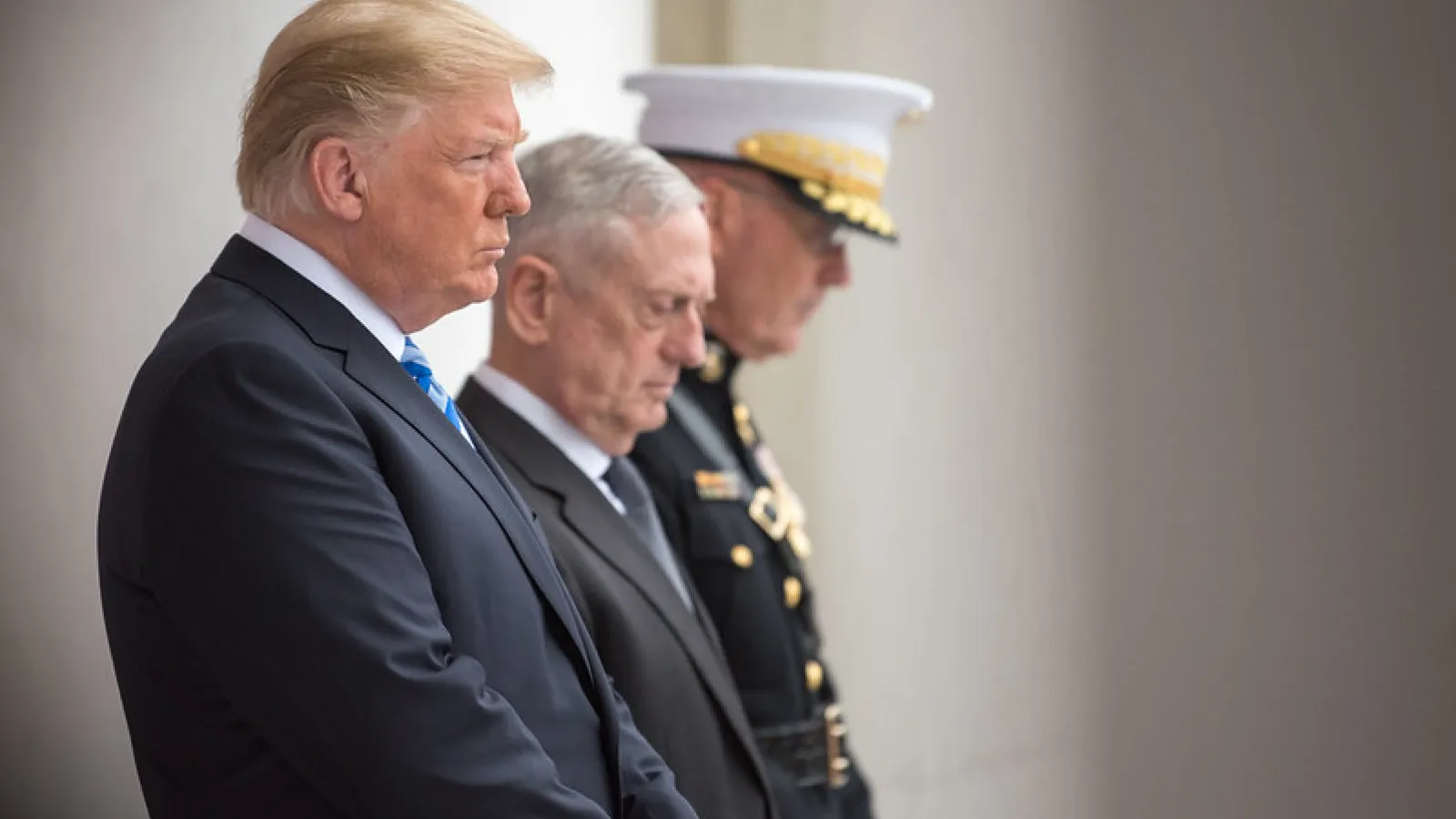 President Donald J. Trump, Secretary of Defense James N. Mattis and Chairman of the Joint Chiefs of Staff Marine Gen. Joseph F. Dunford Jr., bow their heads during a Memorial Day ceremony at Arlington National Cemetery in Arlington, Va., May 28, 2018. (DoD photo by Army Sgt. Amber I. Smith)