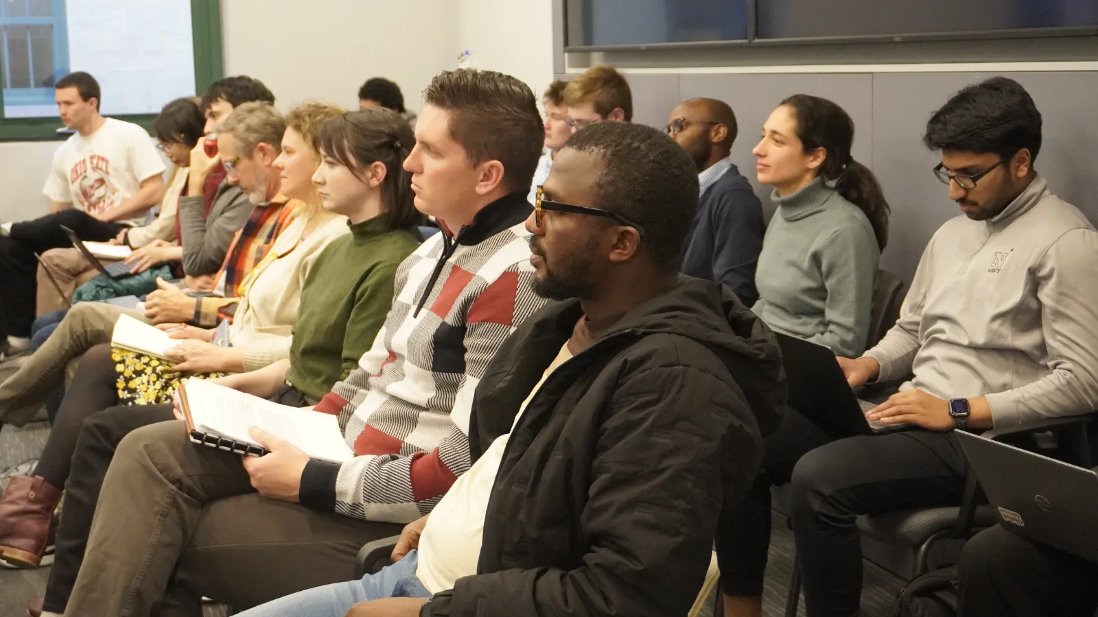 People watching presentation in conference room