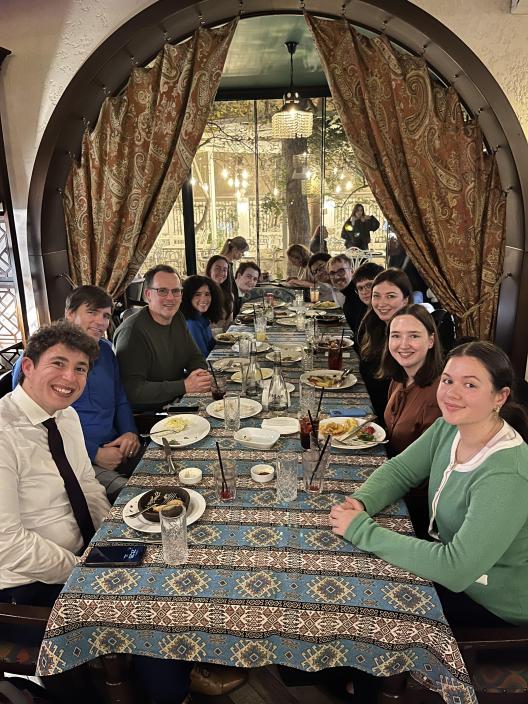 Students eat dinner on the first night of COP29 in Baku Azerbaijan