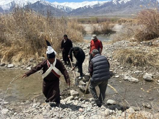 Village headman of Shey village performing Skar-zin or Har-zin ceremony before water diversion from Indus