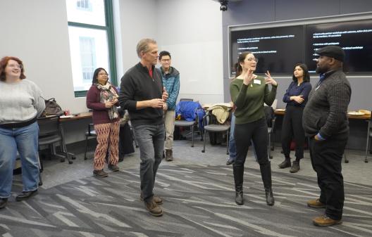 People paired together talking