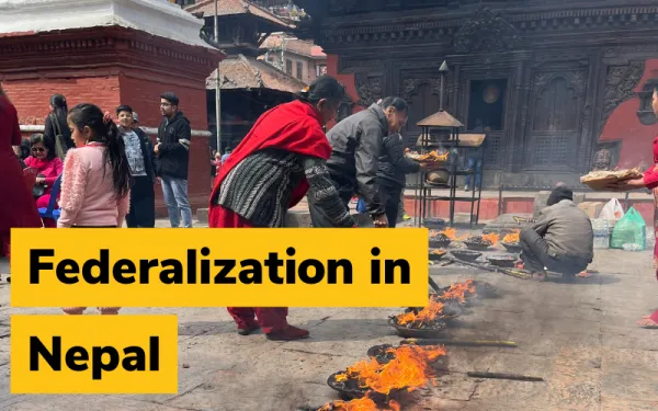 People tending to outdoor ritual fires in Nepal