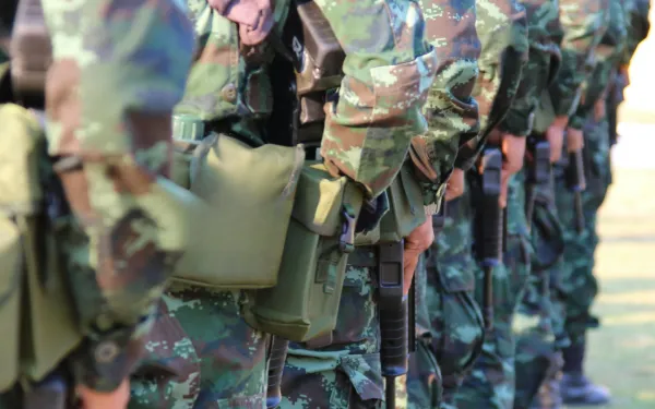 soldiers in camo uniforms