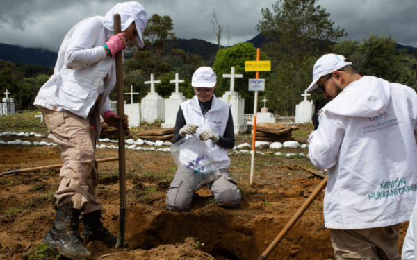 Workers in Colombia search for the disappeared