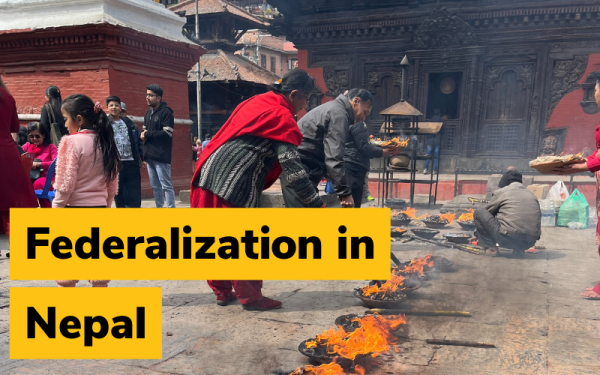 People tending to outdoor ritual fires in Nepal