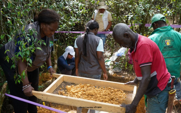 Family members sorting through bones of the disappeared in Colombia