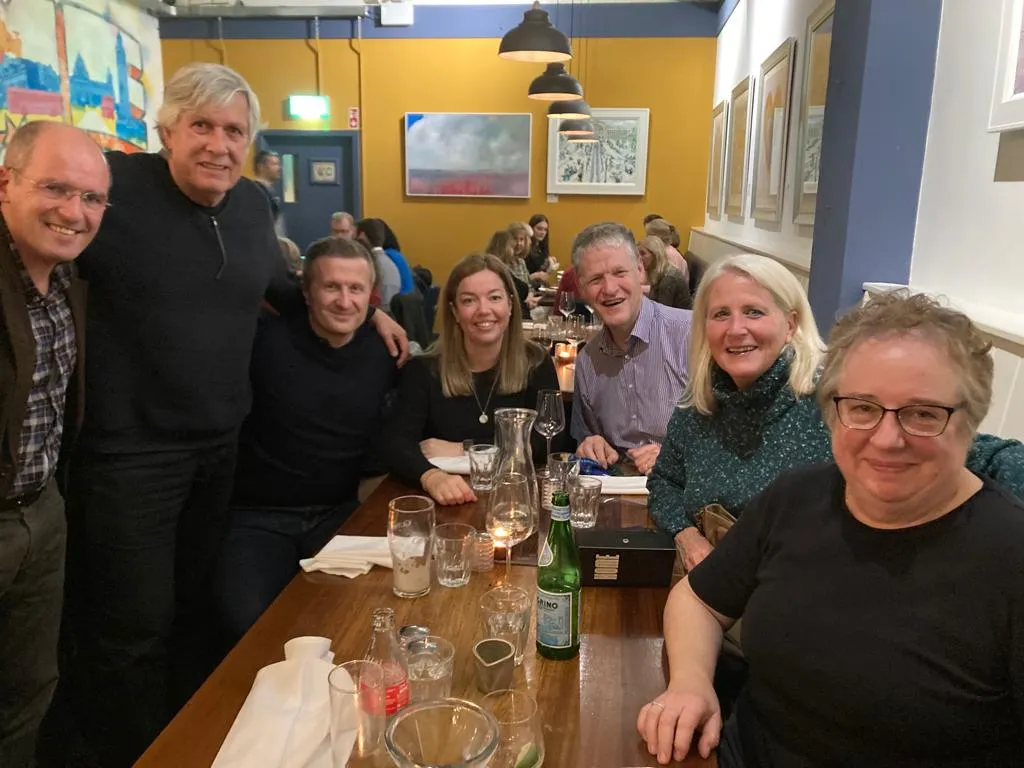 Photo of people at a table
