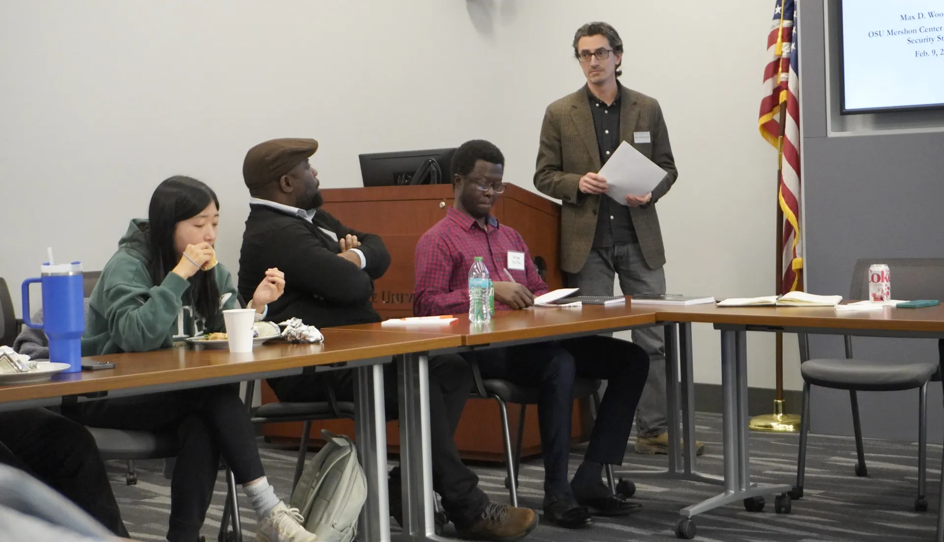 Professor and students in discussion