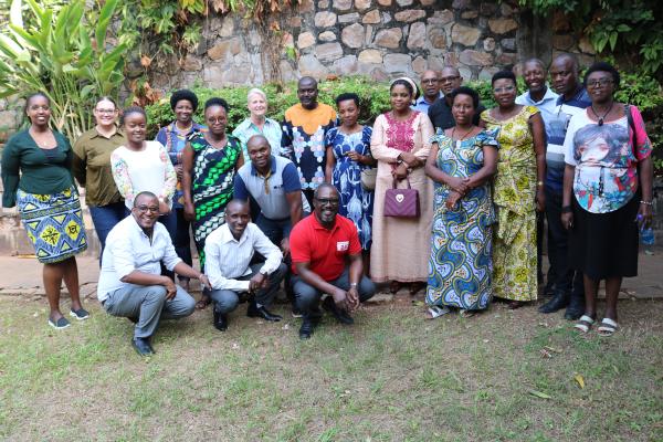 Teri Murphy and others stand in Burundi