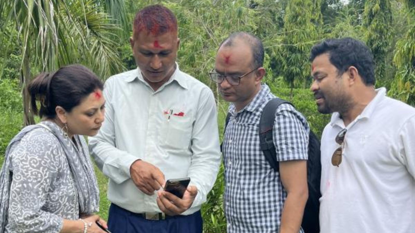 Researchers conferring in Nepal