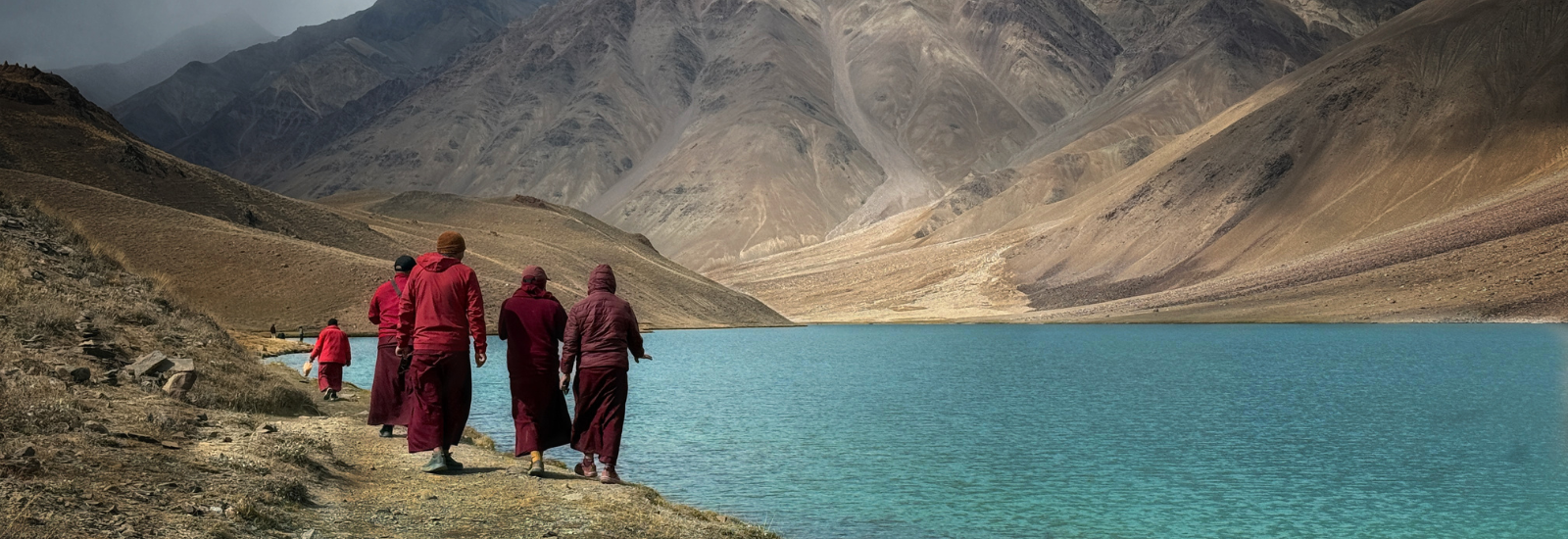 People walking on a river bank